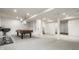 Finished basement featuring a pool table and wet bar area at 6307 Keeneland Ct, Indianapolis, IN 46278