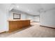 Basement bar featuring wood finishes and ample lighting at 6350 Red Oak Dr, Avon, IN 46123