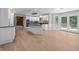 Bright, open kitchen with white cabinetry, island, and modern appliances at 6350 Red Oak Dr, Avon, IN 46123