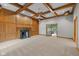 Spacious living room featuring detailed fireplace, coffered ceiling, and natural light at 6350 Red Oak Dr, Avon, IN 46123
