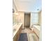 Bright bathroom featuring a dual sink vanity, soaking tub, and separate shower at 6396 Granny Smith Ln, Avon, IN 46123