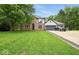 Charming two-story home with a brick facade, well-manicured lawn, and attached two-car garage at 6396 Granny Smith Ln, Avon, IN 46123