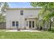 A backyard with a patio seating area, fire pit and sun room at 671 Sonoma Ln, Greenfield, IN 46140