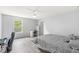 Bedroom with a ceiling fan, desk, and large window at 671 Sonoma Ln, Greenfield, IN 46140