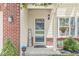 Inviting front entryway with decorative accents, a welcome sign, and a charming storm door at 671 Sonoma Ln, Greenfield, IN 46140