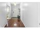 Bright and airy hallway with clean walls and tiled floors at 671 Sonoma Ln, Greenfield, IN 46140