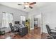 Spacious office area with hardwood floors, a desk, computer, and natural light at 671 Sonoma Ln, Greenfield, IN 46140
