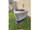 View of Rheem AC Unit in backyard at 6744 Redan Dr, Indianapolis, IN 46254
