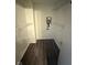 Spacious walk-in closet with wire shelving and wood-look flooring, providing ample storage space at 6744 Redan Dr, Indianapolis, IN 46254