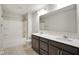Bathroom features a shower over bath, double sinks and spacious countertops at 6830 Park Grove Blvd, Whitestown, IN 46075