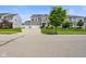 Inviting two-story home featuring a three-car garage, attractive landscaping, well-manicured lawn, and a welcoming curb appeal at 6830 Park Grove Blvd, Whitestown, IN 46075
