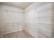Spacious walk-in closet is fitted with wire racks for maximum storage space at 6830 Park Grove Blvd, Whitestown, IN 46075