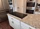 Kitchen with granite countertops, an electric cooktop, stainless appliances and double ovens at 6862 Riverside Way, Fishers, IN 46038