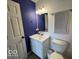 A full bathroom with a white vanity and fixtures at 7022 Cordova Dr, Indianapolis, IN 46221
