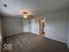 A spacious bedroom with a ceiling fan and access to the bathroom at 7022 Cordova Dr, Indianapolis, IN 46221