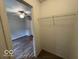 This is a bedroom closet with a wire rack for storage at 7022 Cordova Dr, Indianapolis, IN 46221