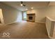 A large living room featuring a brick fireplace at 7022 Cordova Dr, Indianapolis, IN 46221