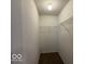 A walk-in closet with carpet flooring and wire shelving at 7022 Cordova Dr, Indianapolis, IN 46221