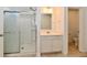 Bathroom boasts glass enclosed shower and sleek vanity at 7147 Buckley Branch Dr, Indianapolis, IN 46259