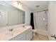 Bright bathroom with double sink vanity, large mirror, and a shower-tub combination at 7147 Buckley Branch Dr, Indianapolis, IN 46259