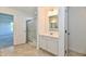 Bathroom offers walk-in shower with glass doors and a vanity at 7147 Buckley Branch Dr, Indianapolis, IN 46259