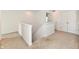 Upstairs hallway features carpet flooring and white trim at 7147 Buckley Branch Dr, Indianapolis, IN 46259