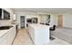 Modern kitchen with stainless steel appliances, a large island, and ample counter space at 7147 Buckley Branch Dr, Indianapolis, IN 46259