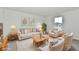 Bright living room with neutral furniture, area rug, decor and natural light from the window at 7147 Buckley Branch Dr, Indianapolis, IN 46259