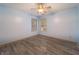 Comfortable bedroom with vinyl flooring and ample natural light streaming through two windows, creating a relaxing ambiance at 7545 Briarstone Dr, Indianapolis, IN 46227