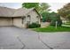 Charming home exterior with a brick facade and well-manicured landscaping at 7545 Briarstone Dr, Indianapolis, IN 46227