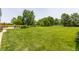 Expansive backyard featuring lush green grass and lots of trees at 7935 N County Road 650 E, Brownsburg, IN 46112