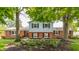 Inviting home showcasing brick and siding exterior, enhanced by well-maintained landscaping and mature trees at 7935 N County Road 650 E, Brownsburg, IN 46112