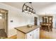 Bright kitchen with island and adjacent dining area, offering ample space for meal preparation and Gathering gatherings at 7935 N County Road 650 E, Brownsburg, IN 46112