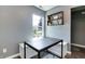 Dining area offers a large window with a view of a lawn and neighborhood at 7942 Dillon Pl, Indianapolis, IN 46236