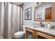 Well-lit bathroom featuring granite countertops and a framed mirror at 842 Cheltenham Way, Avon, IN 46123