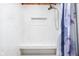 Elegant shower with a built-in bench, marble-style wall and tiled niche at 842 Cheltenham Way, Avon, IN 46123