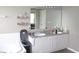 Bathroom with a double sink vanity, large mirror and soaking tub in view at 8519 Frosty Rose Dr, Avon, IN 46123
