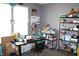 Bedroom with a craft table and wire shelves at 8519 Frosty Rose Dr, Avon, IN 46123