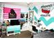 Bedroom featuring a bed, dresser, desk, and an eclectic collection of decorations at 8519 Frosty Rose Dr, Avon, IN 46123