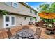 Back deck with outdoor seating and a view of the yard at 9302 Budd Run Dr, Indianapolis, IN 46250