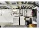 Basement laundry area with white washer and dryer hookups, and a utilitarian atmosphere at 9302 Budd Run Dr, Indianapolis, IN 46250