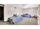 Bedroom featuring carpet, ceiling fan, and two twin beds at 9302 Budd Run Dr, Indianapolis, IN 46250