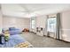 Spacious bedroom with neutral carpet and two windows for ample natural light at 9302 Budd Run Dr, Indianapolis, IN 46250