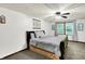 Bedroom with natural light, ceiling fan, and a tranquil design at 9302 Budd Run Dr, Indianapolis, IN 46250