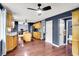 Open concept kitchen with an island, stainless steel appliances, and direct views to a dining and workspace area at 9302 Budd Run Dr, Indianapolis, IN 46250