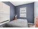 Cozy bedroom featuring a comfortable bed, ample natural light, and a peaceful ambiance at 938 N Tuxedo St, Indianapolis, IN 46201