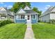 This home includes a well maintained front yard and inviting front porch that adds character at 938 N Tuxedo St, Indianapolis, IN 46201