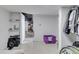 Unfinished basement storage space features a door leading to additional unfinished space at 952 Lasalle St, Indianapolis, IN 46201