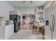 Kitchen with tile floors, and appliances; view into the living room with lots of natural light at 952 Lasalle St, Indianapolis, IN 46201