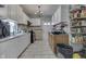 Kitchen with clean white cabinetry, lots of natural light, tile floors, and stainless steel sink at 952 Lasalle St, Indianapolis, IN 46201